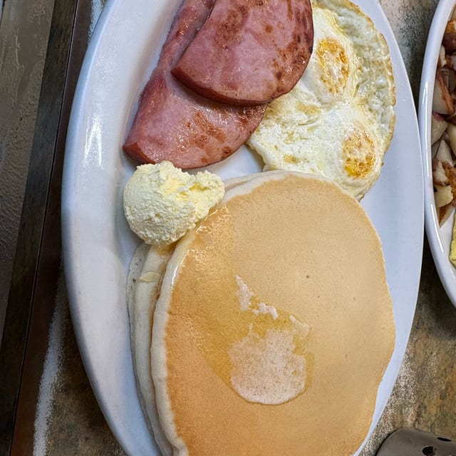 Two Pancakes, 2 Eggs. (Bacon, Link or Patty Sausage, or Ham).